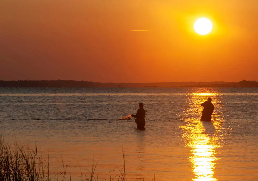 Two Flyfishers at Sunset